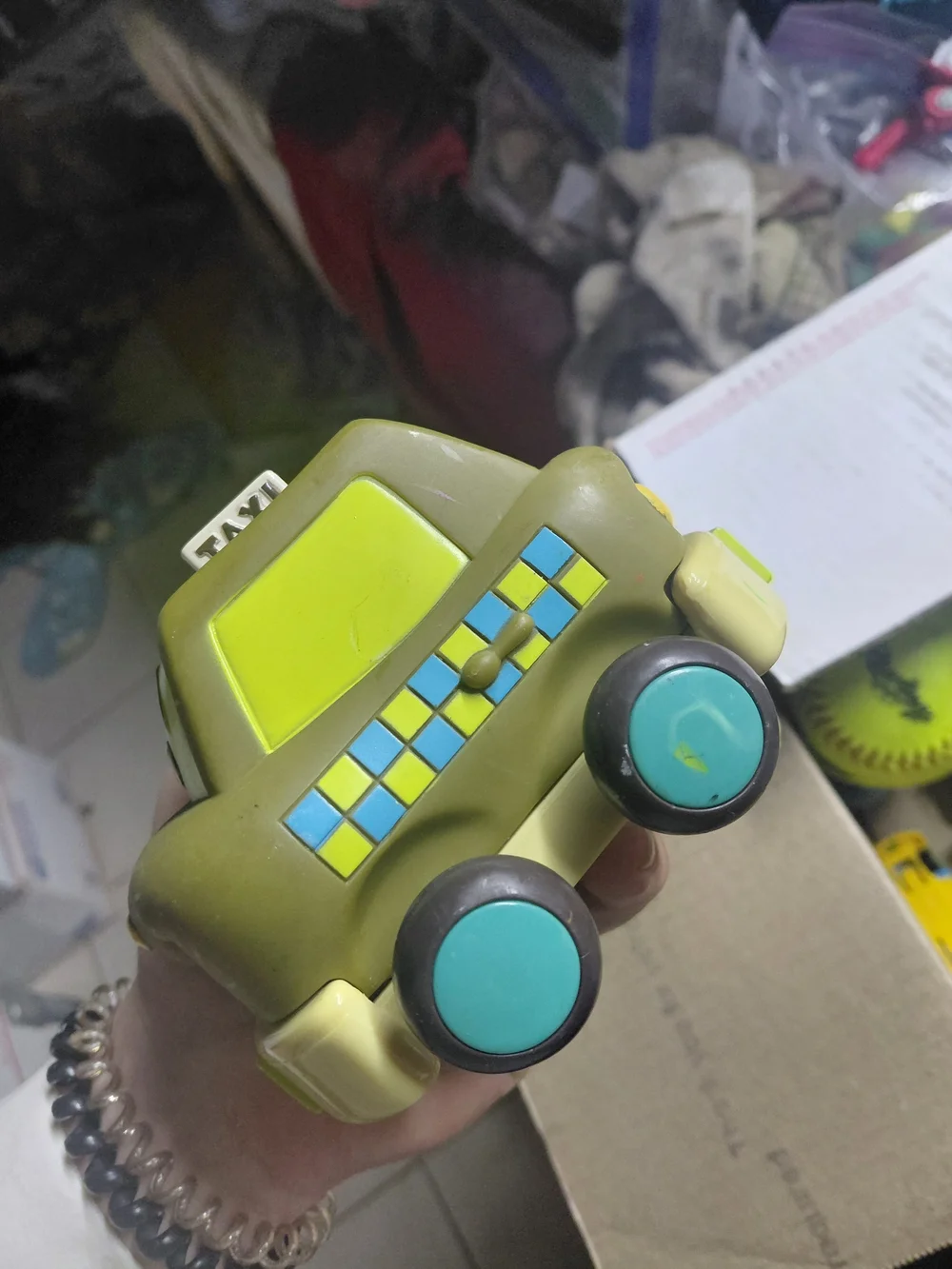 B. toys Just B You Pull-Back Taxi is a chunky olive green toy car
